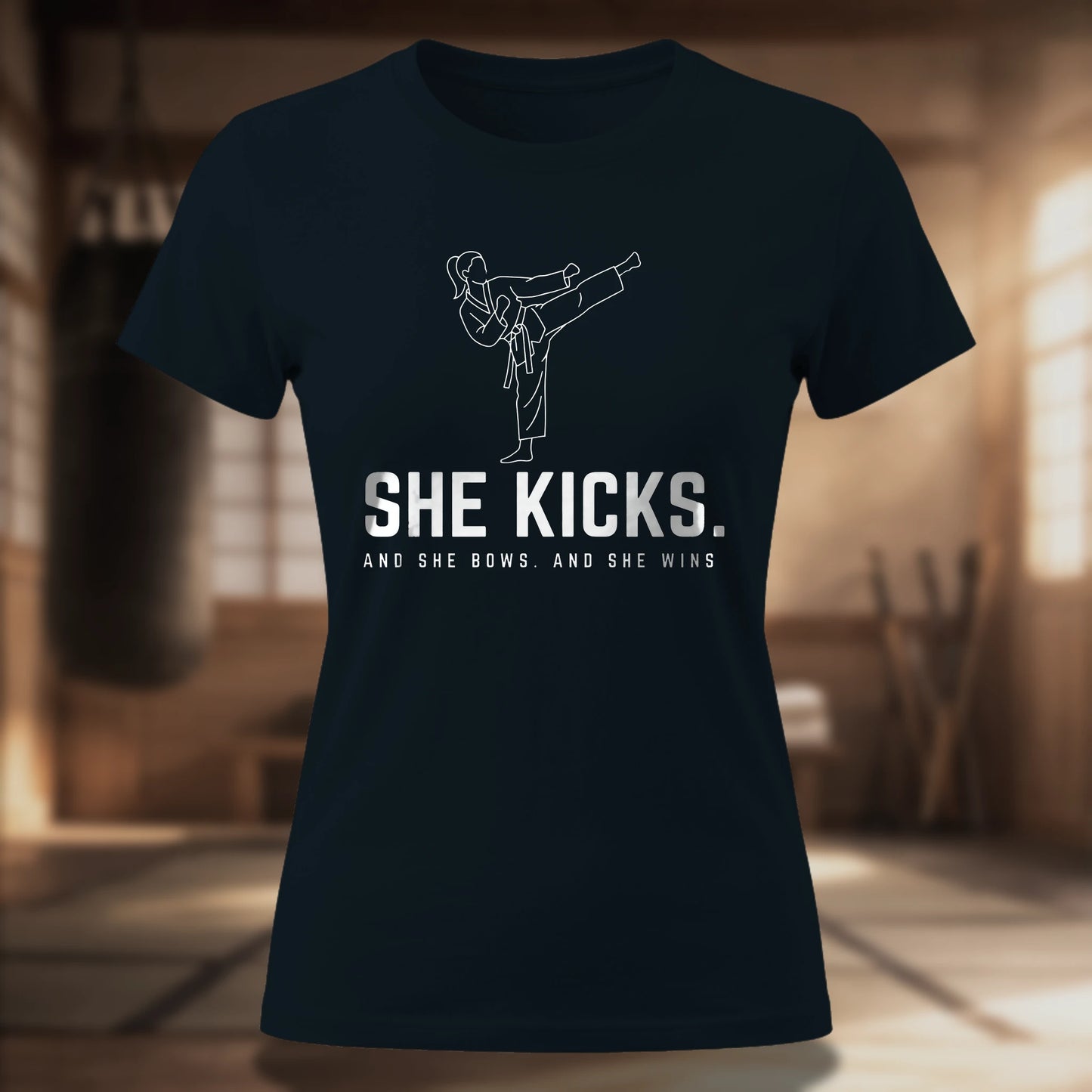She Kicks. Women's Tee