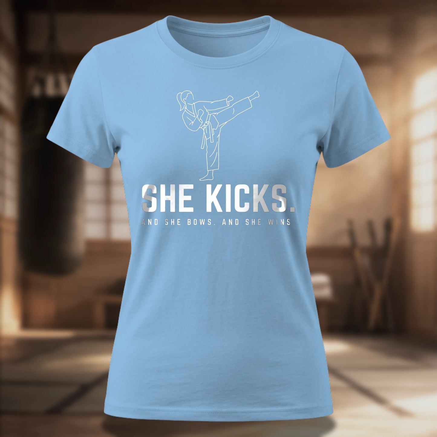 She Kicks. Women's Tee