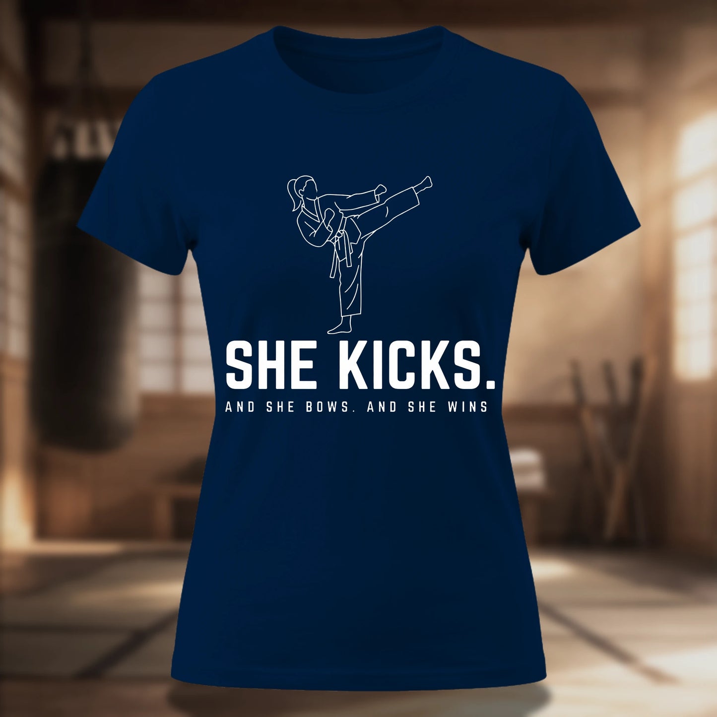 She Kicks. Women's Tee